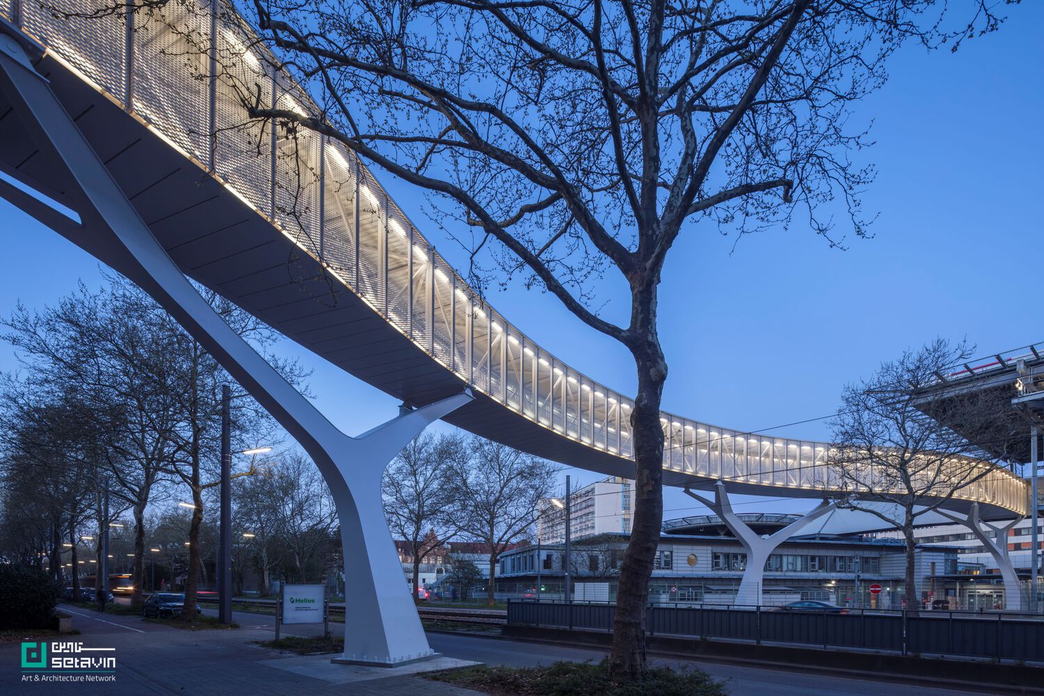 Bridge Municipal Hospital Karlsruhe, Caspar Schols, Werner Sobek, Healthcare Architecture, Infrastructure Design, Bridge Design, Germany, معماری پل, معماری درمانی, زیرساخت شهری, پل بیمارستانی, طراحی شهری پایدار, Helipad Architecture, Karlsruhe Architecture