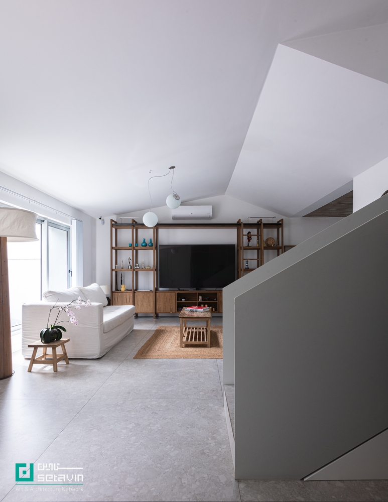 Po-Yo House, MMCV, Buenos Aires architecture, exposed concrete house, residential renovation, contemporary architecture, Argentina architecture, concrete facade, interior-exterior integration, stepped floor plan, architectural case study, Setavin Architecture Network ,بازآفرینی معماری، معماری مسکونی معاصر، بتن اکسپوز، طراحی داخلی مینیمال، خانه Po-Yo، بوئنوس‌آیرس، معماری آرژانتین، MMCV، بازسازی خانه، طراحی ورودی، اتصال فضاهای داخلی و خارجی، ستاوین، پروژه‌های معماری جهان