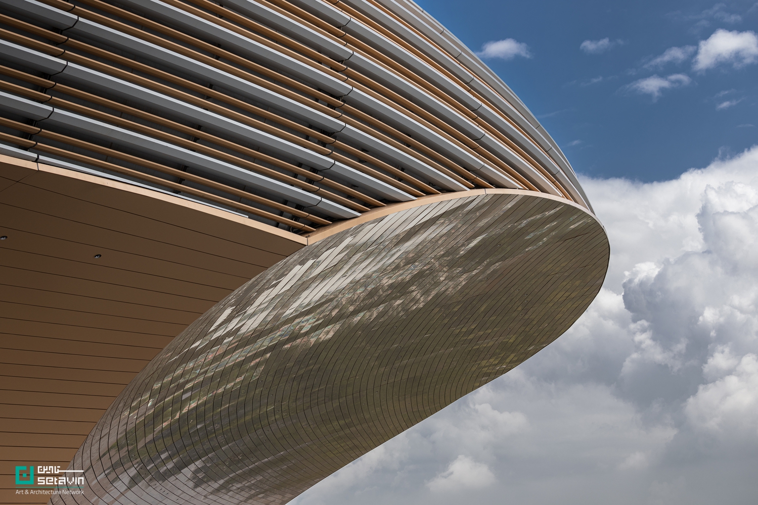 مرکز ورزشی منطقه خلیج بزرگ اثر Zaha Hadid Architects در چین؛ مجموعه‌ای آینده‌نگر با استادیوم ۶۰ هزار نفری، اقلیم‌پذیر و الهام‌گرفته از معماری بومی لینگ‌نان.