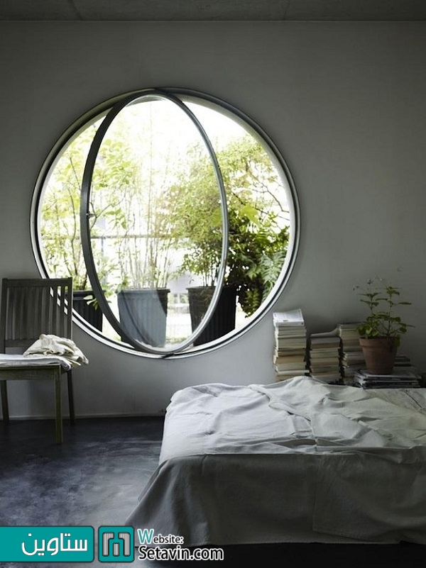 اتاق خوابی با پنجره دایره ای